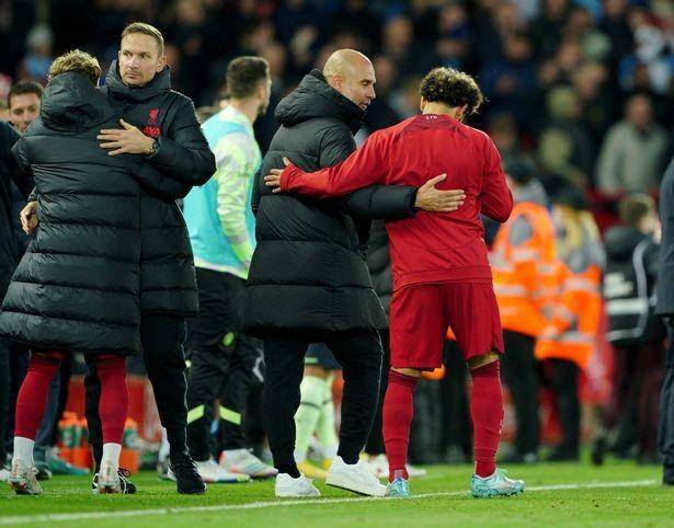 Pep Guardiola dan Mohamed Salah. (mirror.co.uk)
