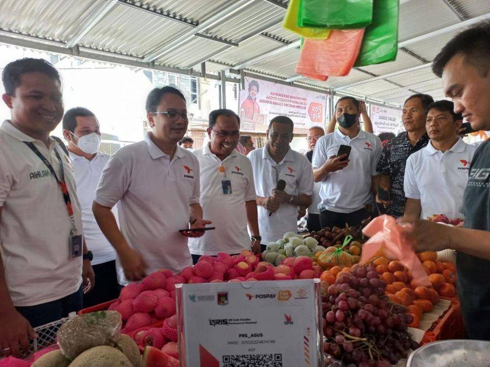 PT Pos Indonesia (Persero) dan Kementerian Perdagangan (Kemendag) menyediakan aplikasi mobile Pospay pada program Digitalisasi Pasar Rakyat (Dok. PT Pos Indonesia)