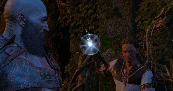 Kratos bersiap meledakkan tombak Draupnir yang menancap di lengan Heimdall ( Dok. Santa Monica Studio / God of War: Ragnarok )