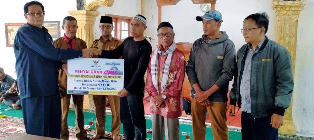 Salah satu program andalan pemerintah untuk menyediakan akses air minum dan sanitasi di pedesaan dengan pendekatan berbasis masyarakat adalah Program Pamsimas. (Dok. Kementerian PUPR)