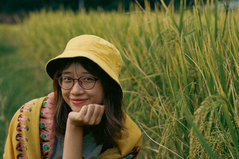 ilustrasi perempuan di sawah (pexels.com/Thành Trần)