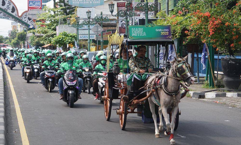 Acara Parade Mitra di Hari Mitra Grab 2022 yang diselenggarakan di Yogyakarta pada Minggu (11/12/2022). (Dok. Grab).
