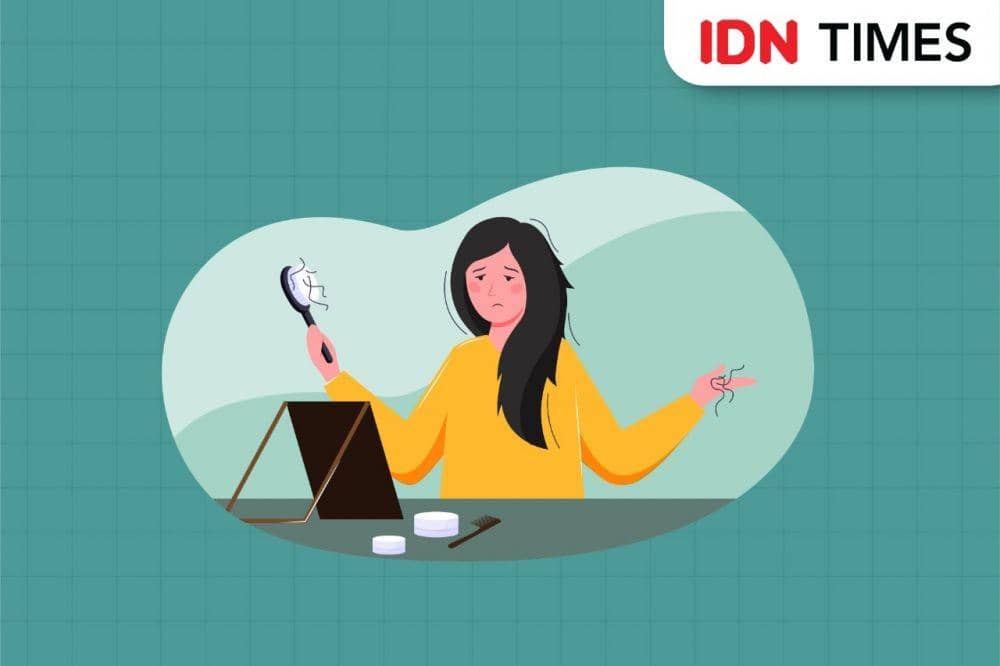 Seorang perempuan mengalami masalah kerontokan rambut.