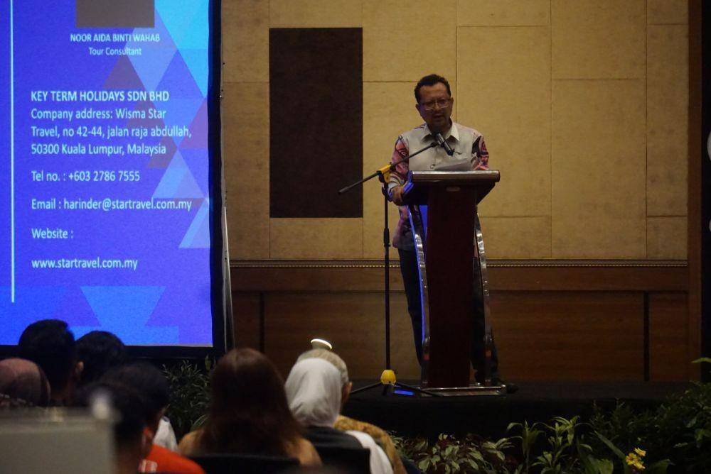 Direktur Tourism Malaysia, Junus Sahid saat memberi sambutan MATTA Travel Exchange (MTEX), di The Alana Hotel & Convention Center, Selasa (13/12/2022). (IDN Times/Herlambang Jati Kusumo).
