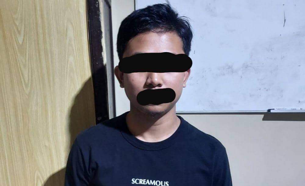 Terduga pelaku pornografi, IS (25) yang diamankan tin Polsek Mariso Makassar. (Istimewa)