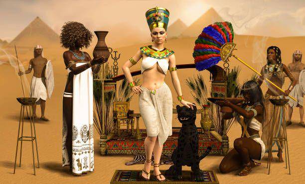 Royal Egyptian Pharaoh Cleopatra dengan pelayan dalam kostum tradisional (istockphoto.com/ratpack223)