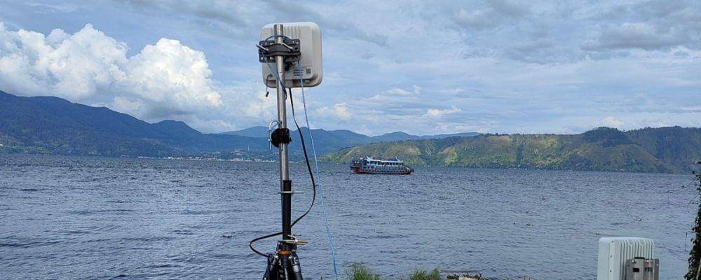 Telkomsel bekerja sama dengan Qualcomm dan Ericsson memanfaatkan koneksi 5G mmWave di Danau Toba. (Dok. Telkomsel)