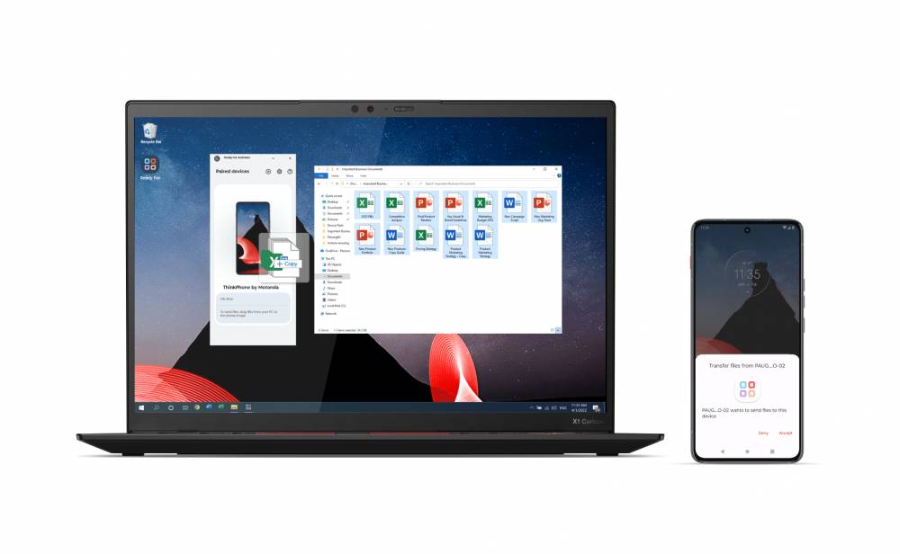 ilustrasi pemindahan data dari Motorola ThinkPhone ke laptop ThinkPad dan sebaliknya (motorola.com)