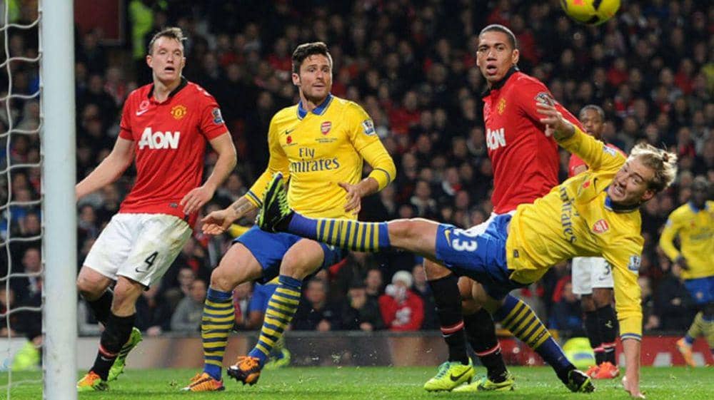 Arsenal melawan Manchester United di EPL 2013/2014. (arsenal.com)