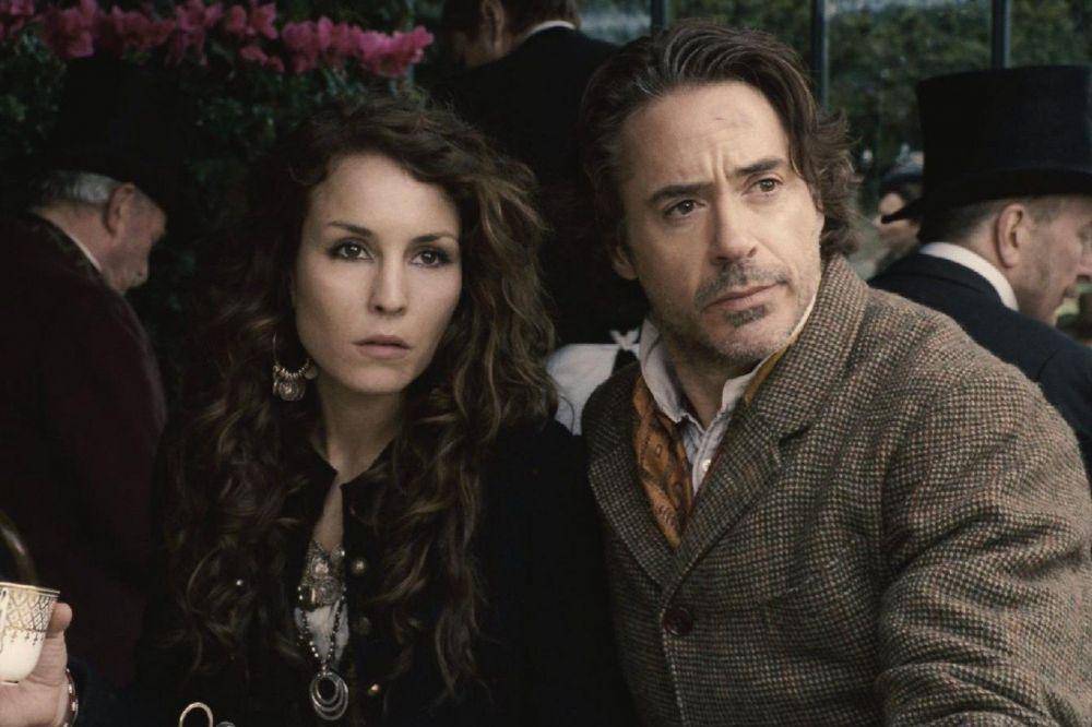 Noomi Rapace dan Robert Downey Jr. dalam film Sherlock Holmes: A Game of Shadows (dok. Warner Bros. Pictures/Sherlock Holmes: A Game of Shadows)