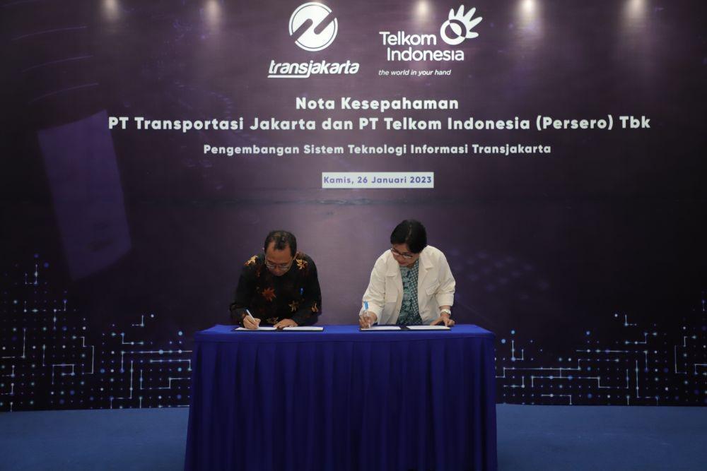 Kembangkan Sistem TI, Telkom dan Transjakarta Teken Kerja Sama