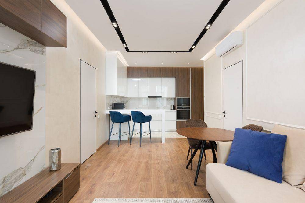 Ilustrasi desain rumah modern minimalis dengan skema warna netral (Pexels/Max Vakhtbovych)