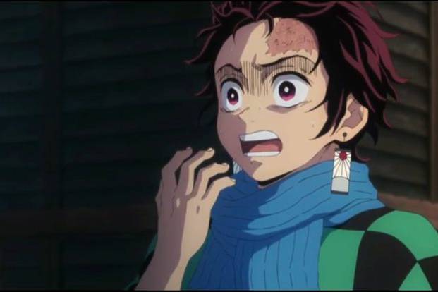 Tanjiro Kamado terkejut melihat Iblis Kuil terbakar (dok. ufotable/Kimetsu no Yaiba)