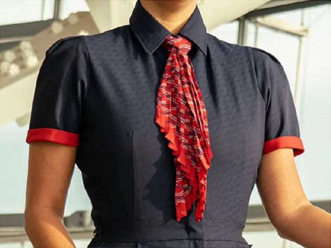 Pola gelombang udara pada jaket, T-shirt, detail kancing, dan dasi (dok. British Airways)