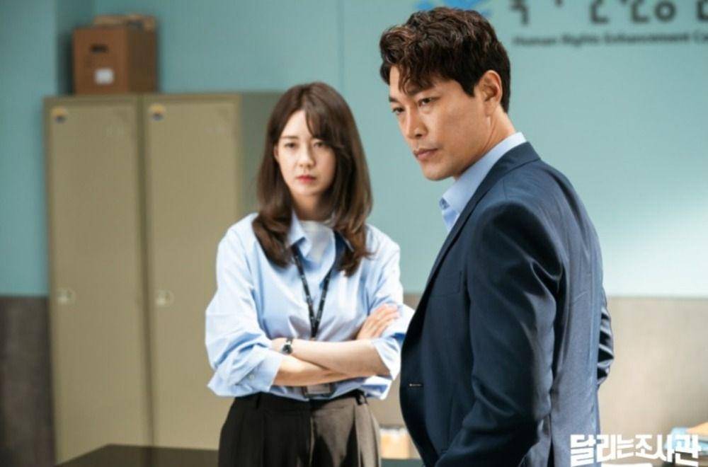 Choi Gwi Hwa dan Lee Yo Won di The Running Mates: Human Rights (dok. OCN/The Running Mates: Human Rights)