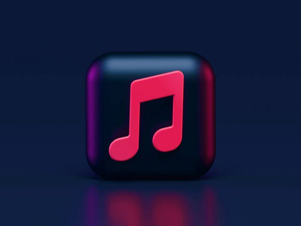 ilustrasi logo Apple Music (unsplash.com/Alexander Shatov)