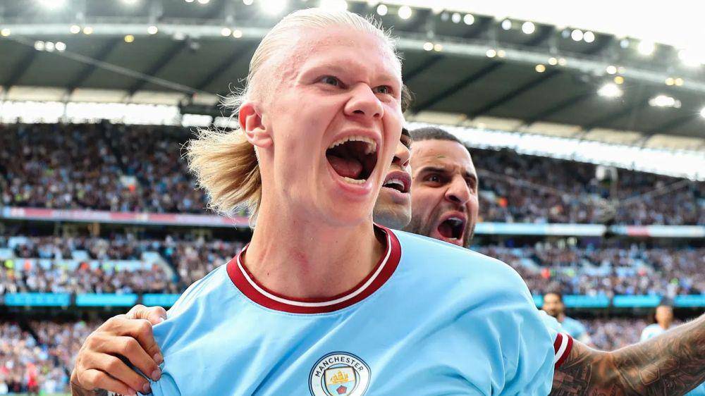 Erling Haaland merayakan hat-trick ke gawang Manchester United. (premierleague.com)