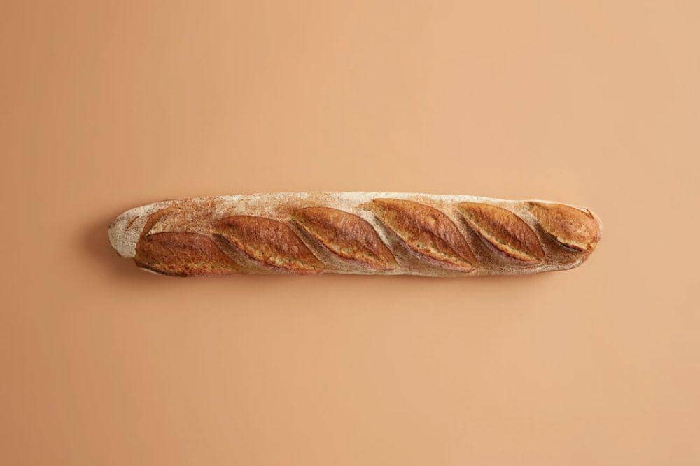 ilustrasi roti prancis (freepik.com/wayhomestudio)