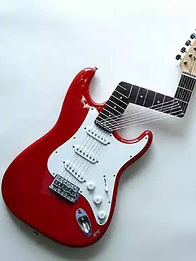 desain gitar yang nyeleneh abis (instagram.com/awreceh.id)