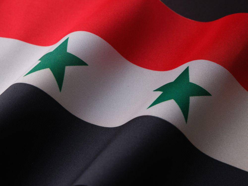 ilustrasi bendera Suriah (Unsplash.com/Engin Akyurt)