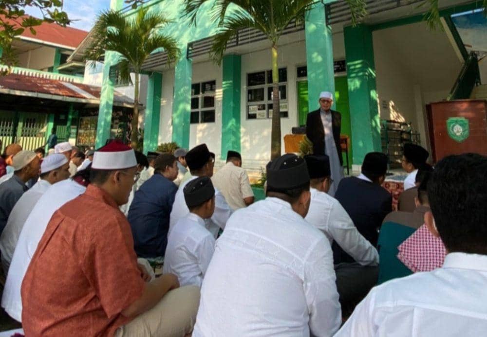 Jemaah Muhammadiyah di Kota Palembang melaksanakan salat Id (Dok: istimewa)