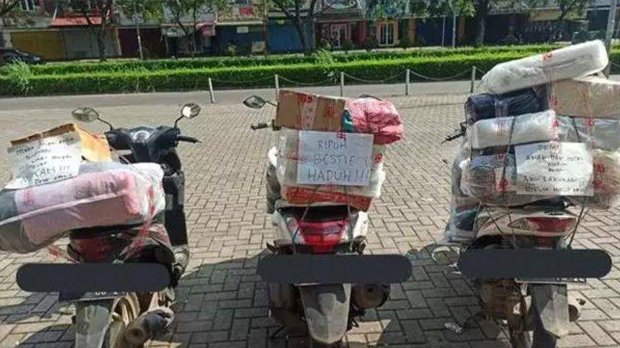 kurir antar paket pas Lebaran (twitter.com/txtdrikurir)
