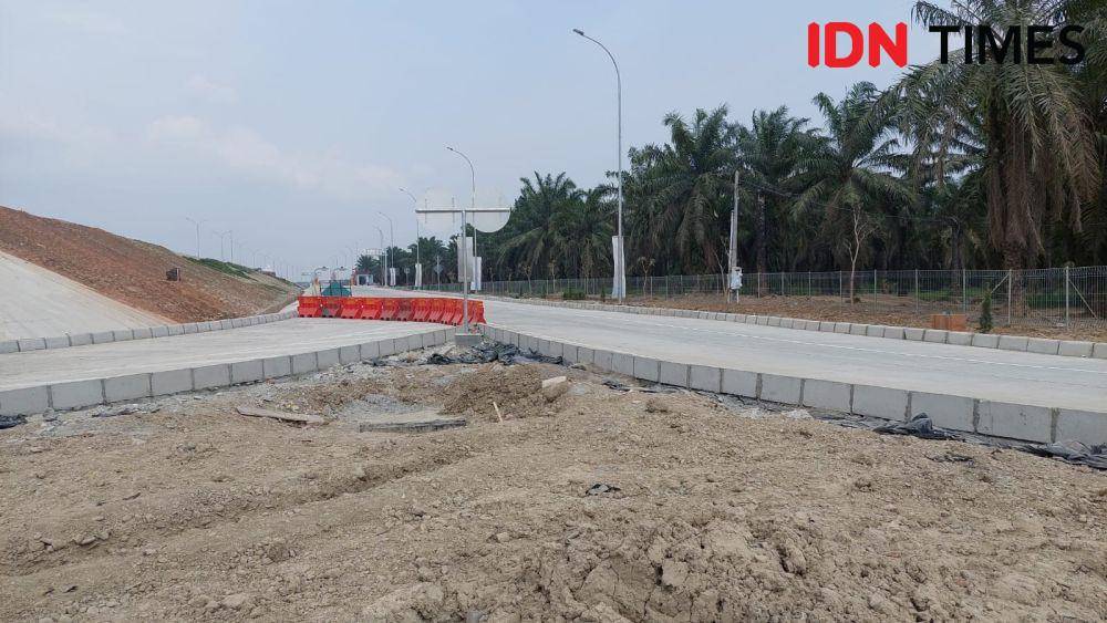 Pintu keluar dan masuk ruas jalur tol stabat kwala bingai (IDN Times/ Bambang Suhandoko)