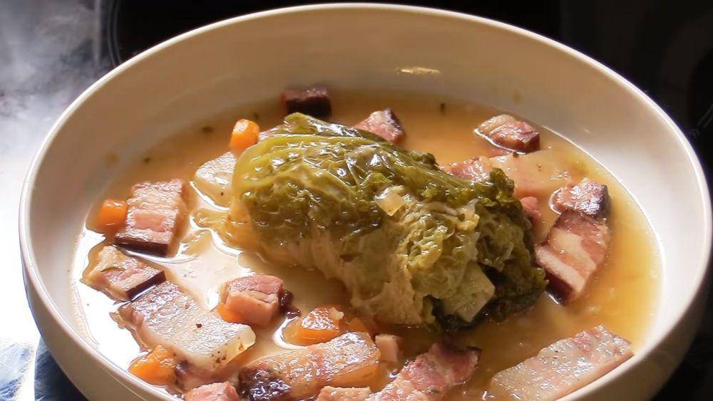 Oven braised savoy cabbage with smoked pork. (YouTube.com/French Cooking Academy)