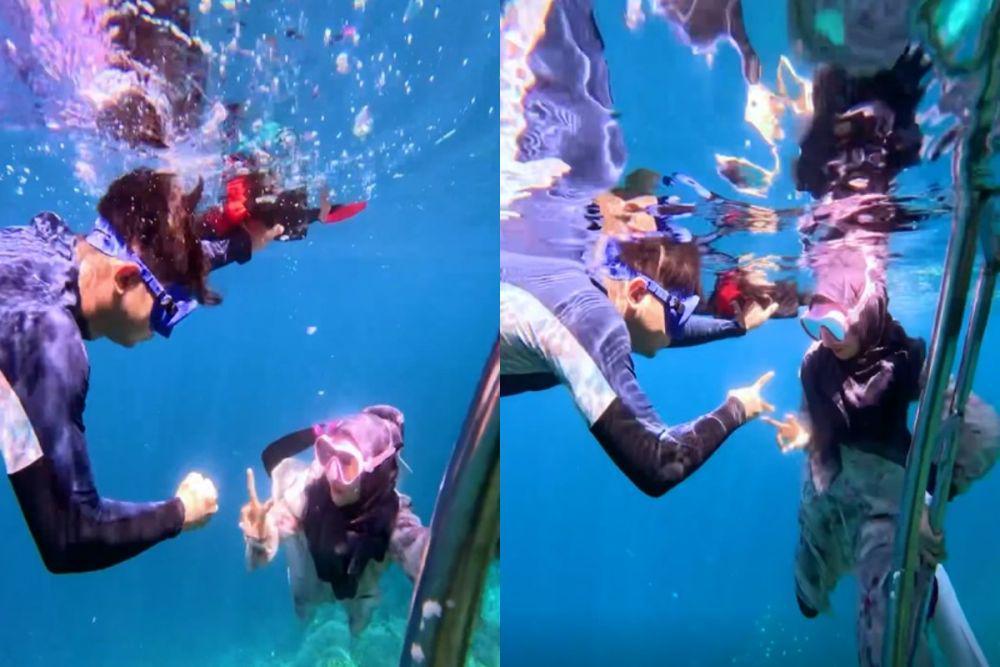 9 Potret Ria Ricis Main Suit di Dalam Laut dengan Suami, Pakai Gamis!