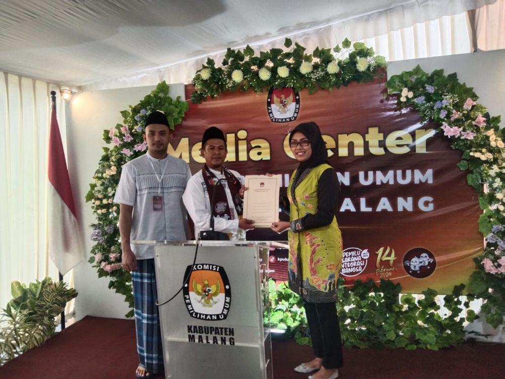Ketua DPD PAN Kabupaten Malang, Sutiono bersama Ketua KPU Kabupaten Malang, Anis Suhartini. (IDN Times/Rizal Adhi Pratama)