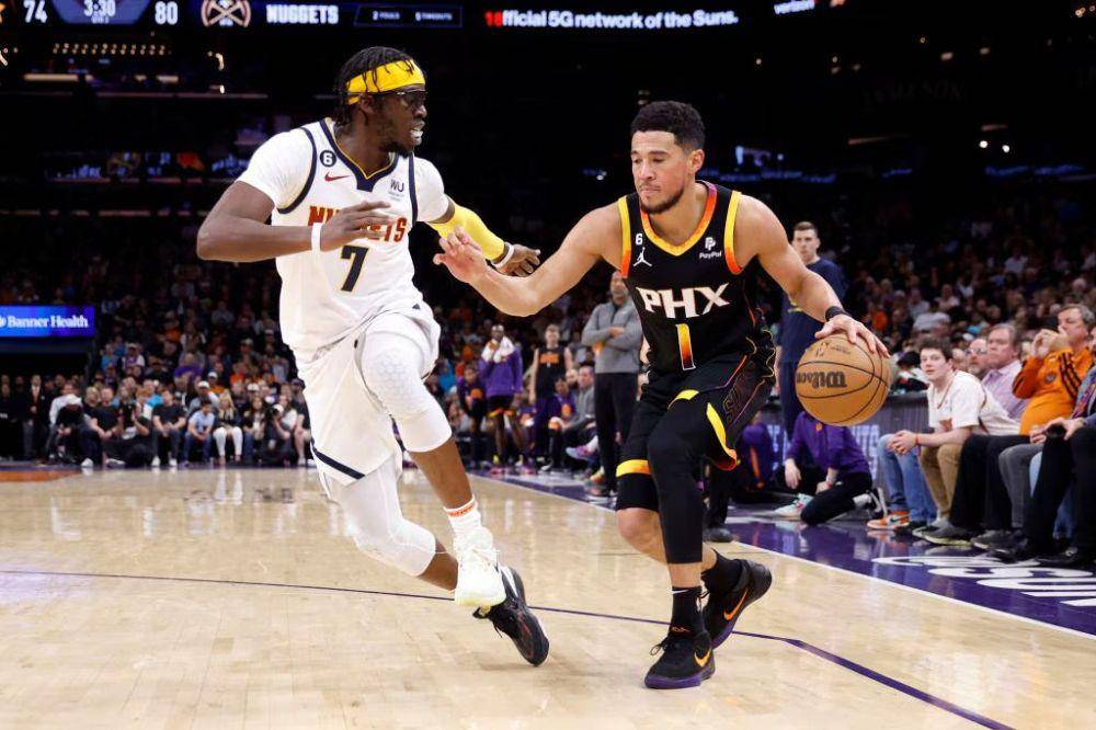 Reggie Jackson dan Devin Booker (nba.com)