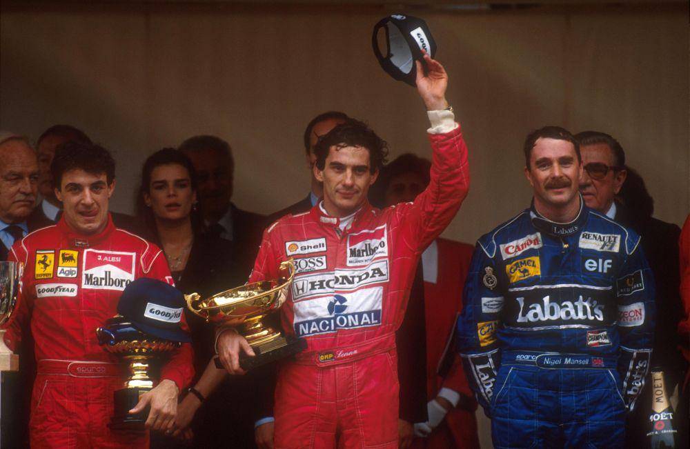Ayrton Senna memenangi GP Monako 1991 ditemani Nigel Mansell di podium kedua dan Jean Alesi di podium ketiga. (twitter.com/McLaren)