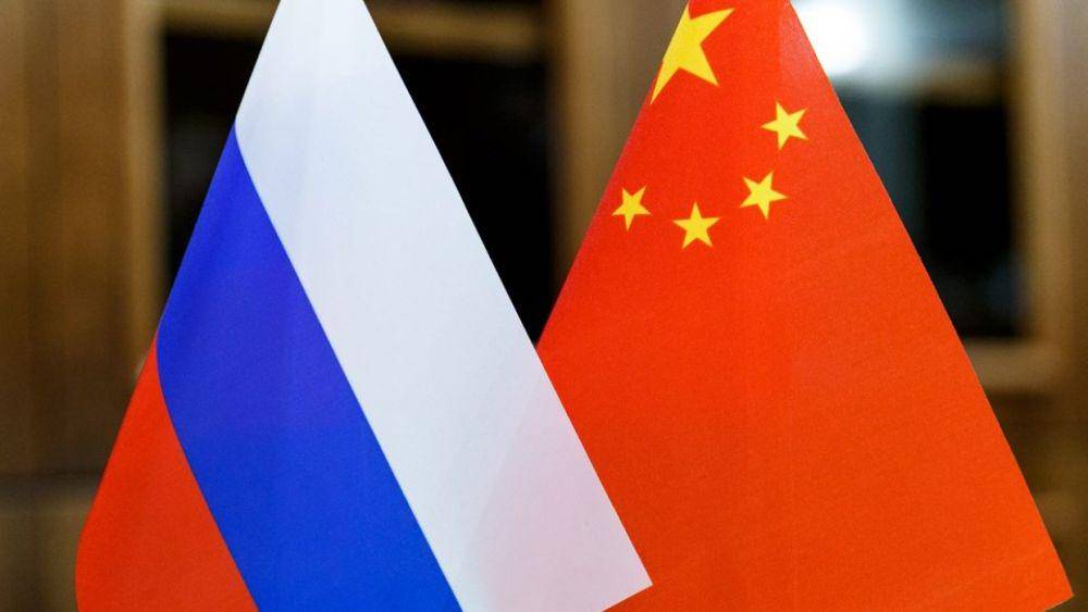 Ilustrasi bendera Rusia dan China (twitter.com/mfa_russia)