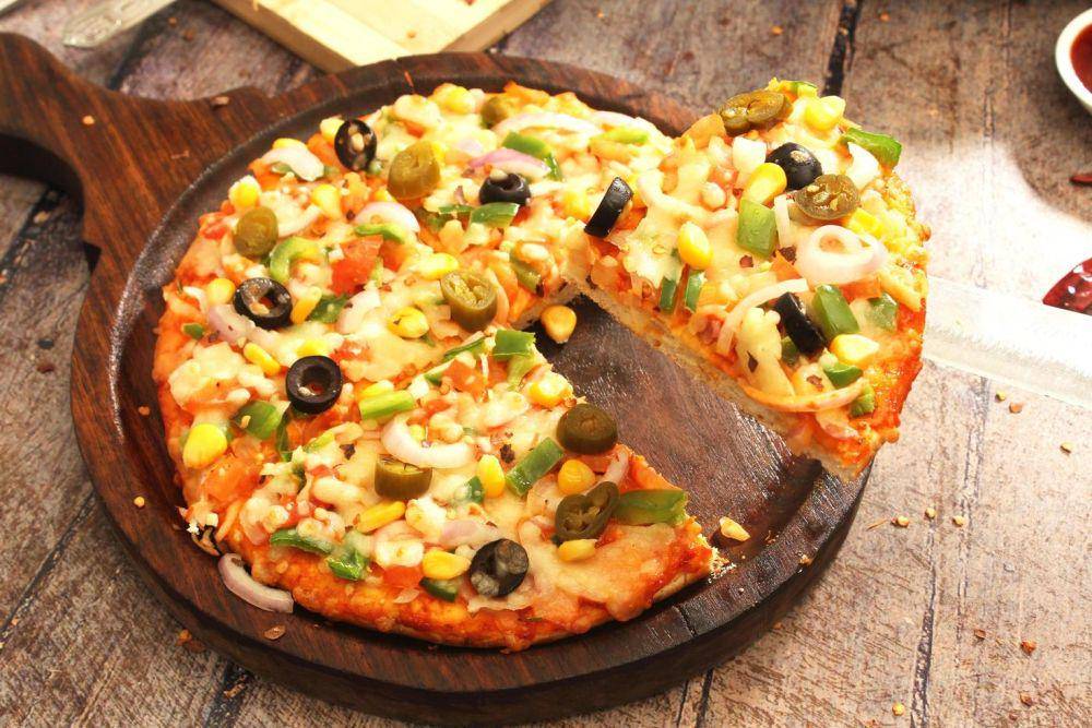 ilustrasi pizza (vecteezy.com/Yovan Verma)