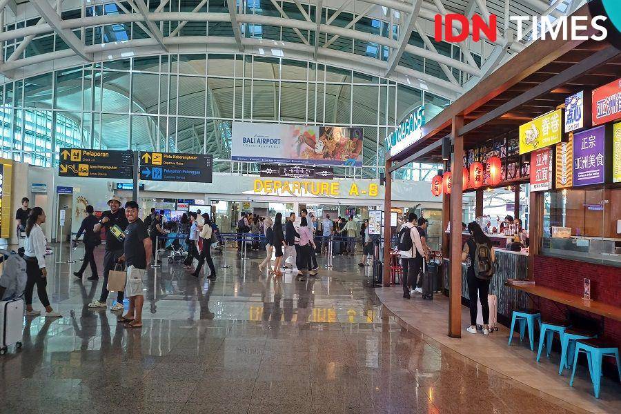 Ilustrasi suasana di Bandara Internasional I Gusti Ngurah Rai, Bali (IDN Times/Dhiya Awlia Azzahra)