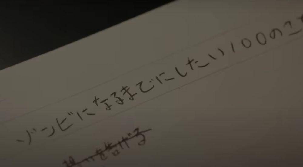 Tendo menulis 100 hal yang ingin dilakukan sebelum jadi zombie (dok. Netflix/ Zom 100: Bucket List of the Dead)