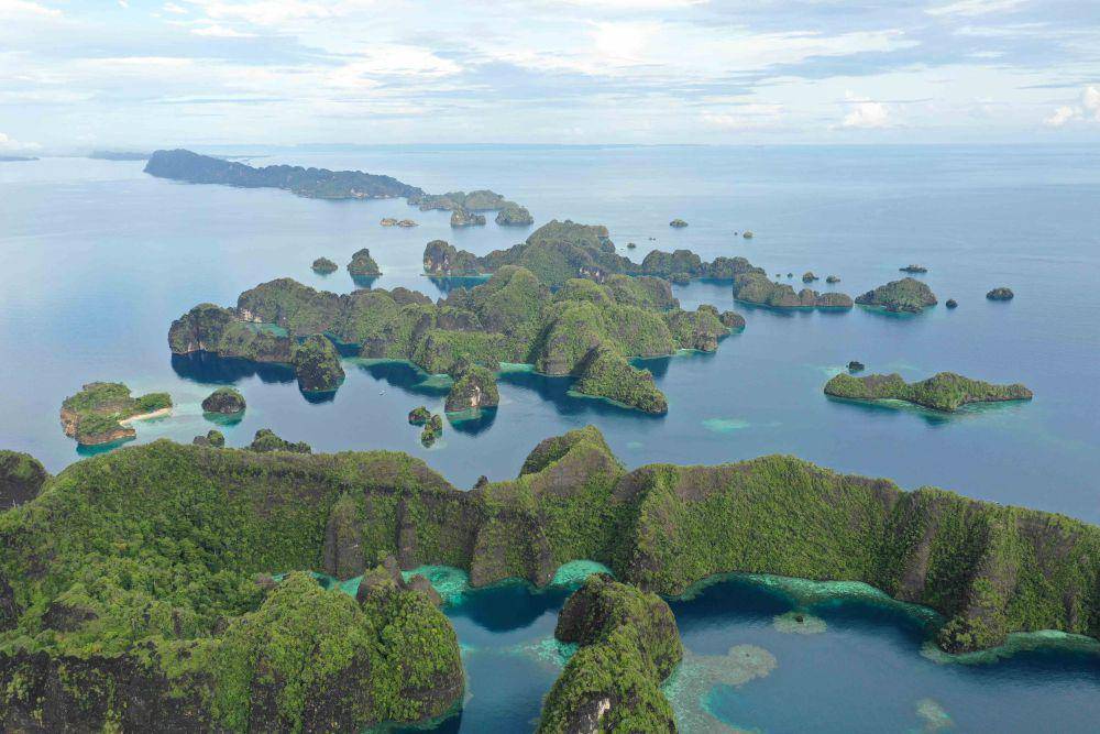 Ilustrasi Pulau Raja Ampat ( unsplash.com/Danang Himawan )