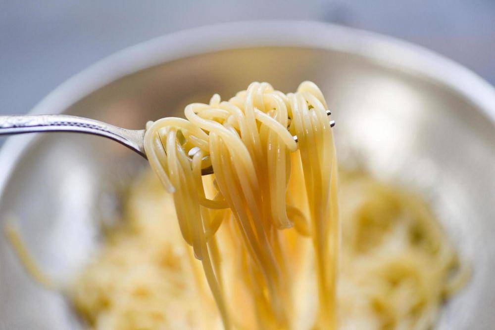 ilustrasi memasak spagheti (vecteezy.com/Bigc Studio)