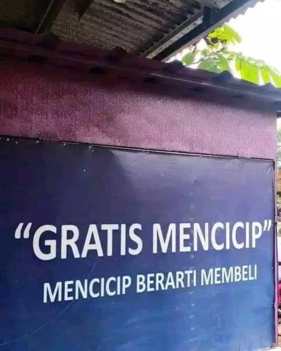 spanduk bertuliskan gratis yang menjebak (facebook.com/Zulkifli)