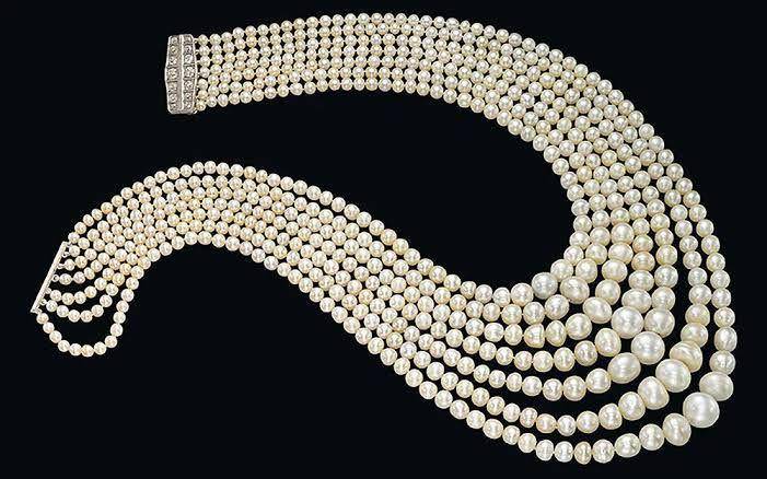The 7-Strand “Festoon” Natural White Pearl Necklace (www.purepearls.com)