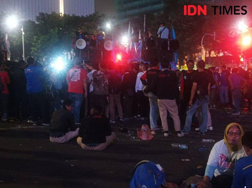 Demo buruh di kawasan Patung Kuda dekat Monas akhirnya berhenti (IDN Times / Dini Suciatiningrum)