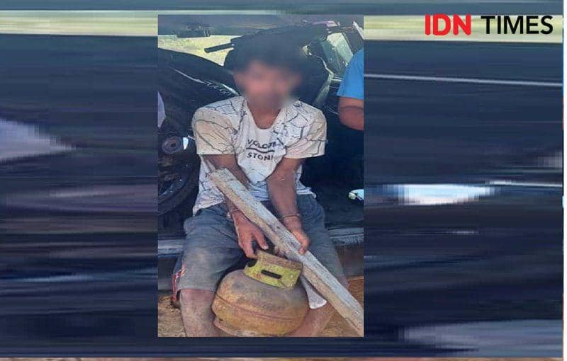 Tersangka ID berserta barang bukti satu tabung elpiji 3 Kg. Foto Humas Polres PPU (IDN Times/Ervan)