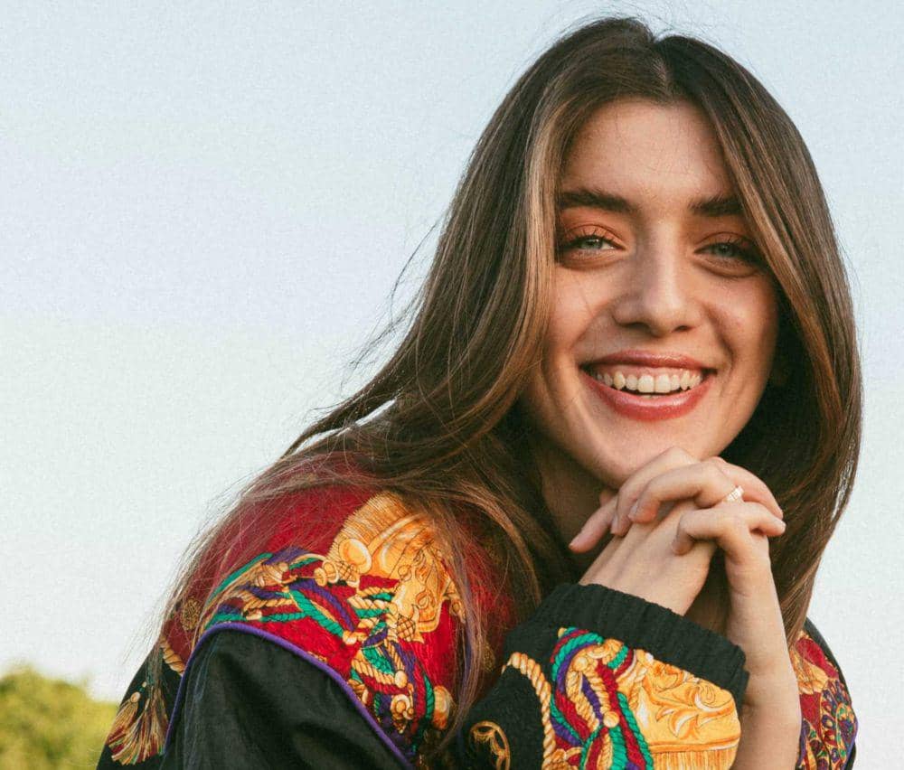 Ilustrasi perempuan tersenyum manis (Pexels.com/Sama Bairamavo)