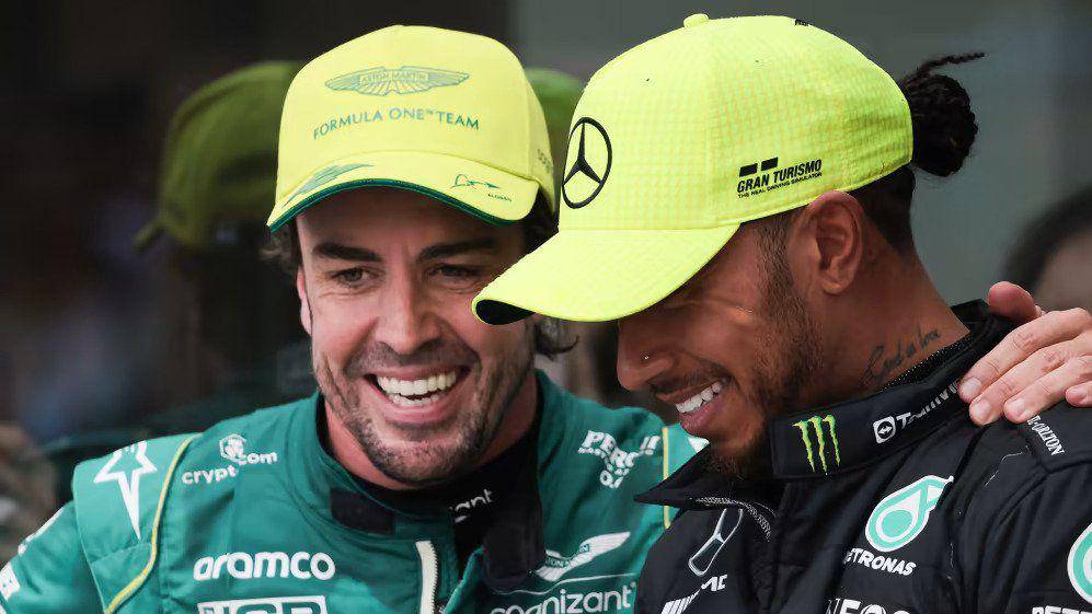 Fernando Alonso [kiri] dan Lewis Hamilton (formula1.com)