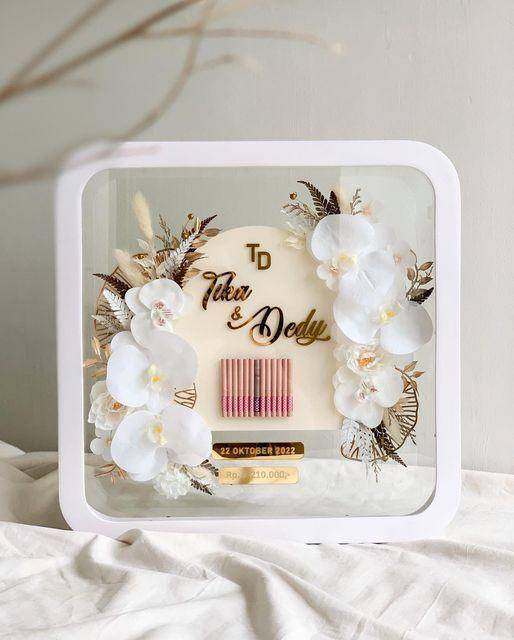 inspirasi mahar uang dengan dekorasi pop up frame (instagram.com/fipapier)