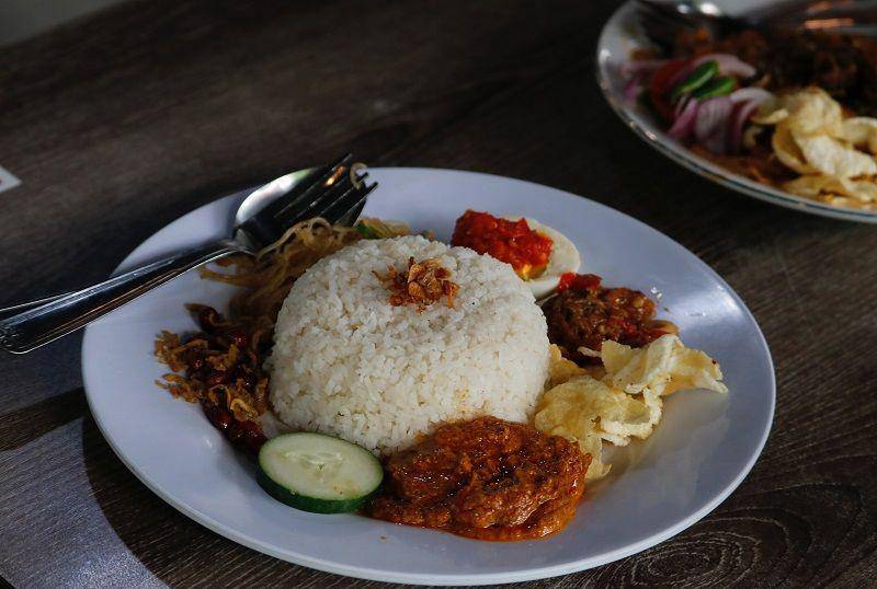 ilustrasi nasi lemak Malaysia (unsplash.com/Aldrin Rachman Pradana)