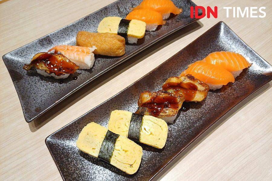 Ilustrasi sushi (IDN Times/Dhiya Awlia Azzahra)