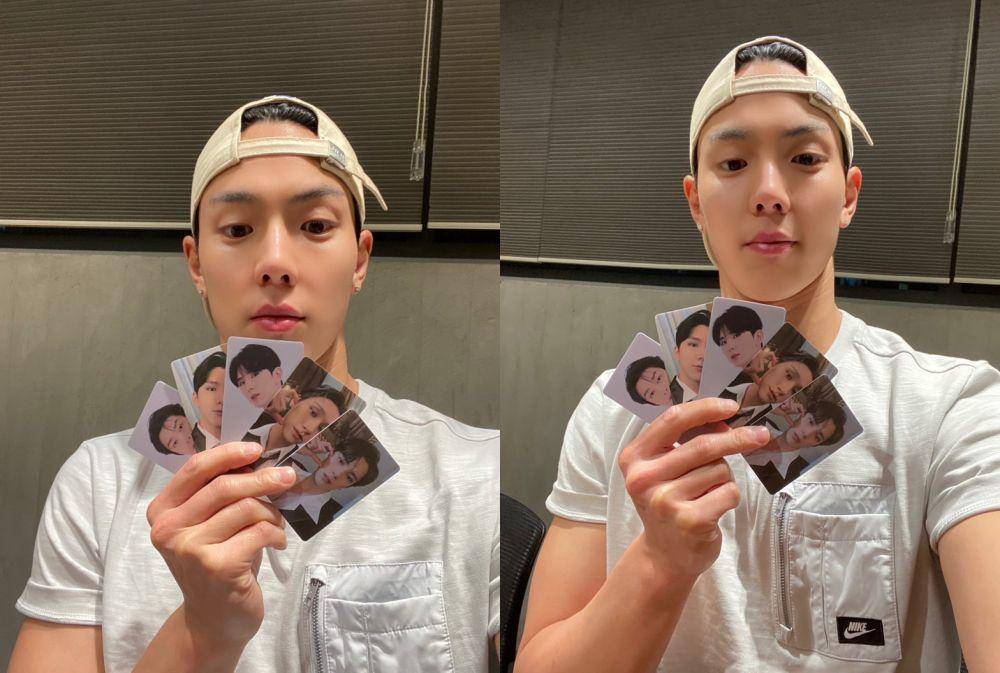 Shownu MONSTA X dengan koleksi photocard-nya (twitter.com/officialmonstax)
