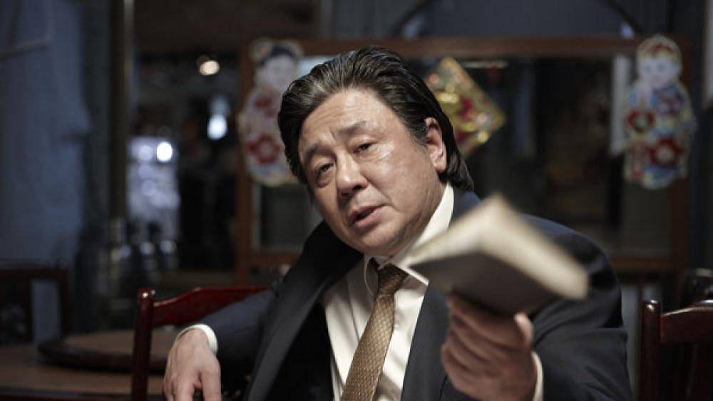 Choi Min Sik dalam film Nameless Gangster. (dok. Showbox/Nameless Gangster)