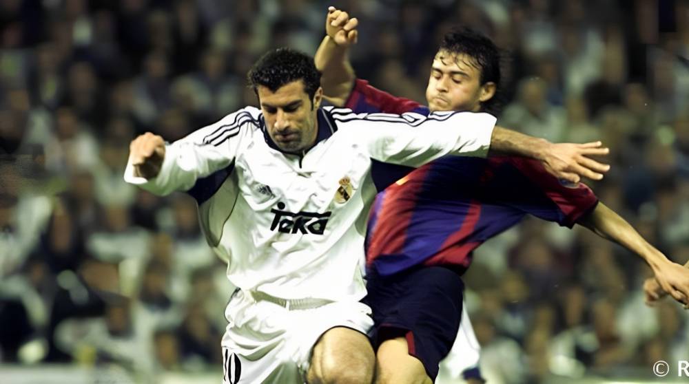 Luis Figo (jersey putih) saat berduel dengan Luis Enrique (belakang). (realmadrid.com)